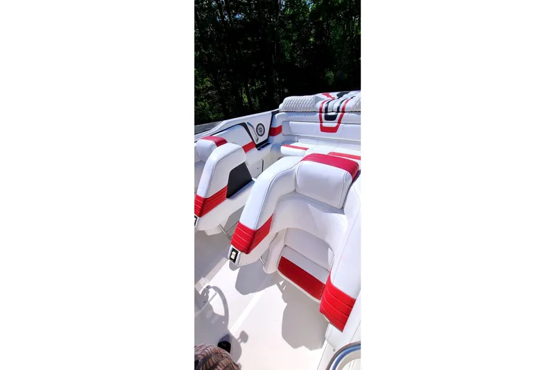 Slide: The Image of Interior of 1995 Fountain 42 Lightning boat with white and red seating. - 16