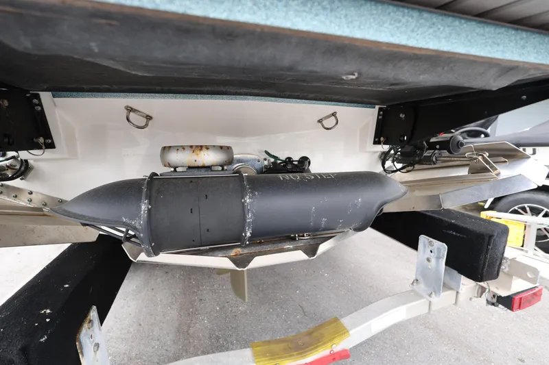 Slide: The Image of 2023 MasterCraft X24 boat underside showing propeller and rudder components. - 9
