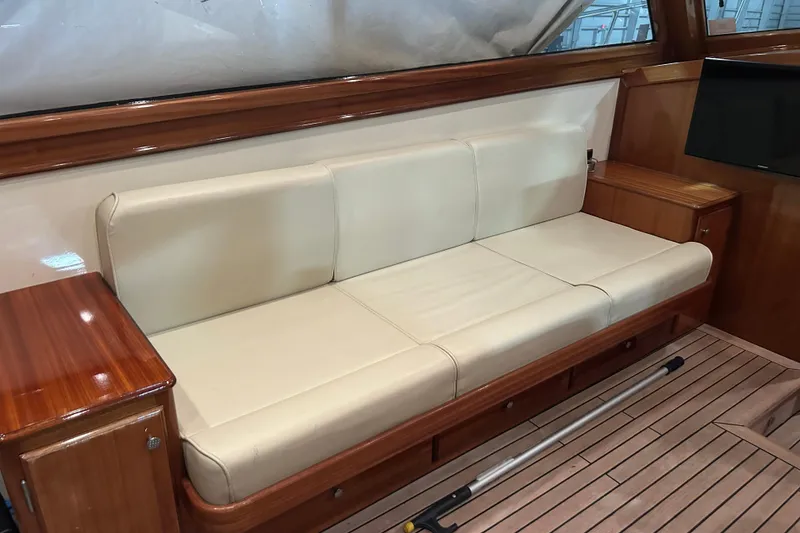 Slide: The Image of Luxurious interior of 2009 Vicem Windsor Craft 36 Hardtop with cream leather seating and wood finish. - 11