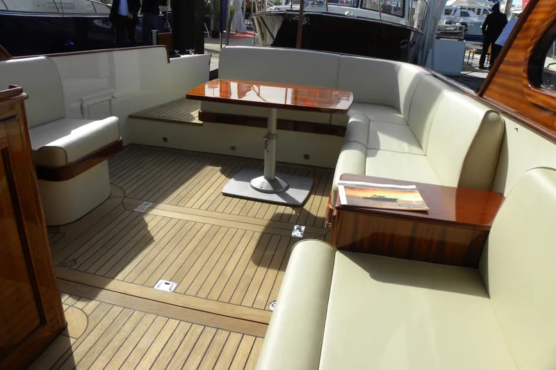 Slide: The Image of Luxurious interior of 2009 Vicem Windsor Craft 36 Hardtop yacht with elegant seating and wooden table. - 7