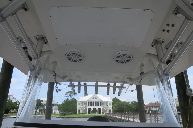 Slide: The Image of 2016 Regulator 28 boat interior view with waterfront homes in the background. - 7