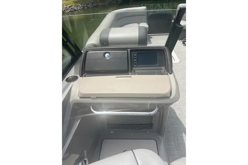 Slide: The Image of 2017 Premier 270 Super Sport boat dashboard with navigation screen and seating area. - 12