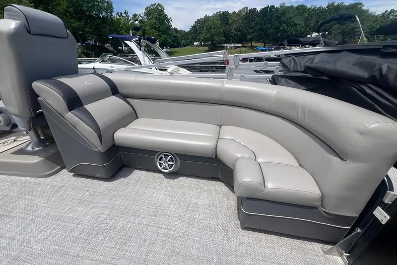 Slide: The Image of Luxurious seating on a 2017 Premier 270 Super Sport boat, featuring sleek gray upholstery. - 13