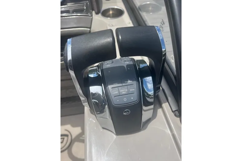 Slide: The Image of Throttle controls of a 2017 Premier 270 Super Sport boat, featuring dual levers. - 16