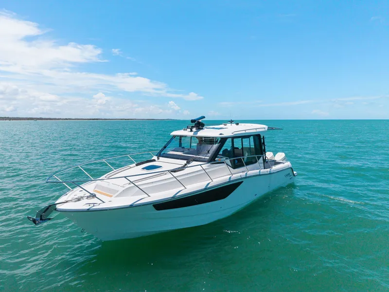 Slide: The Image of 2025 Boston Whaler 365 Conquest on open sea. - 10
