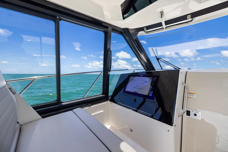 Slide: The Image of Interior view of 2025 Boston Whaler 365 Conquest with ocean view. - 23
