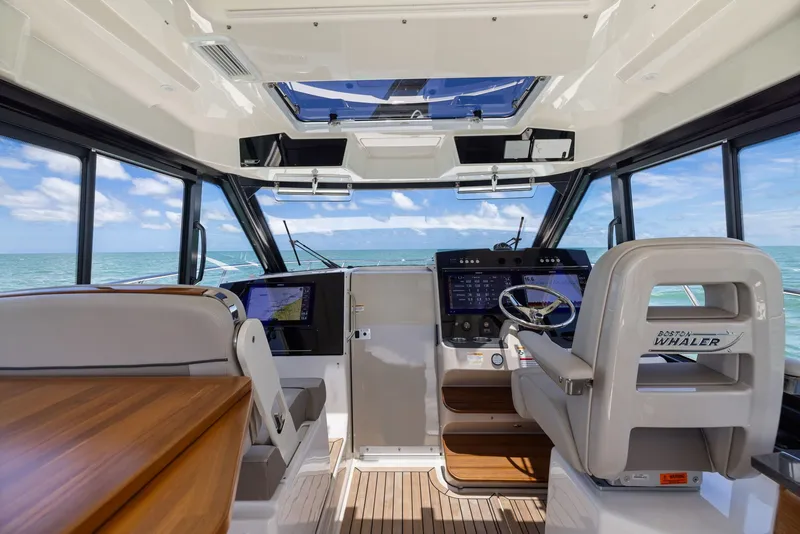 Slide: The Image of Interior of 2025 Boston Whaler 365 Conquest with ocean view. - 34