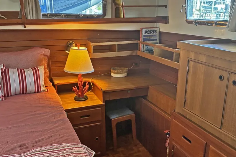 Slide: The Image of Cozy cabin interior of 1991 Grand Banks 42 Motoryacht with wooden furniture and nautical decor. - 21