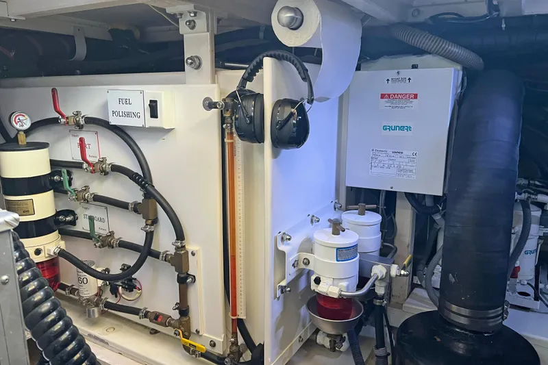 Slide: The Image of Engine room of 1991 Grand Banks 42 Motoryacht with fuel polishing system and equipment. - 27