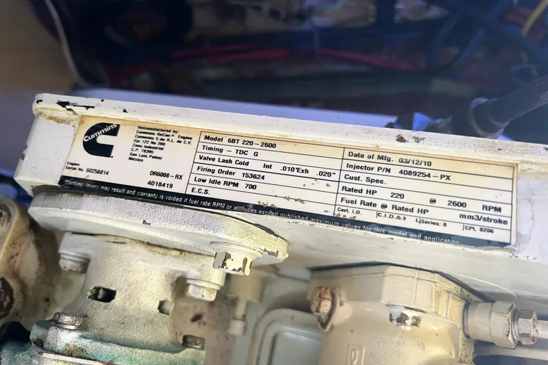 Slide: The Image of Cummins engine label on a 1991 Grand Banks 42 Motoryacht, model 6BT 220-2600. - 29