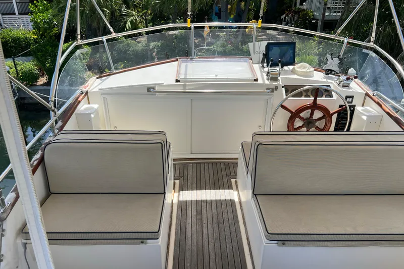 Slide: The Image of Flybridge of 1991 Grand Banks 42 Motoryacht with helm and seating area. - 35