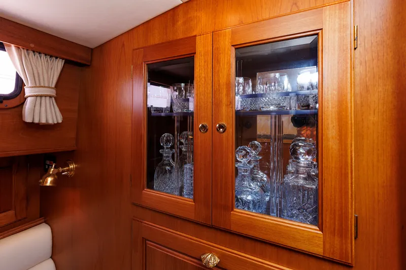 Slide: The Image of Luxurious wooden cabinet with glassware on Alden 52 Salon Express yacht, 2008 model. - 26
