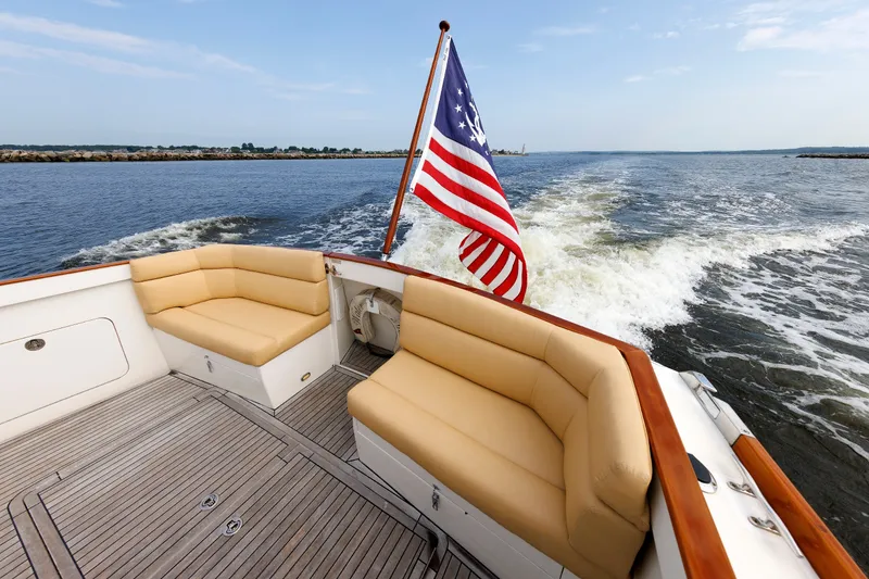 Slide: The Image of Alden 52 Salon Express 2008 yacht with American flag, cruising on open water. - 40
