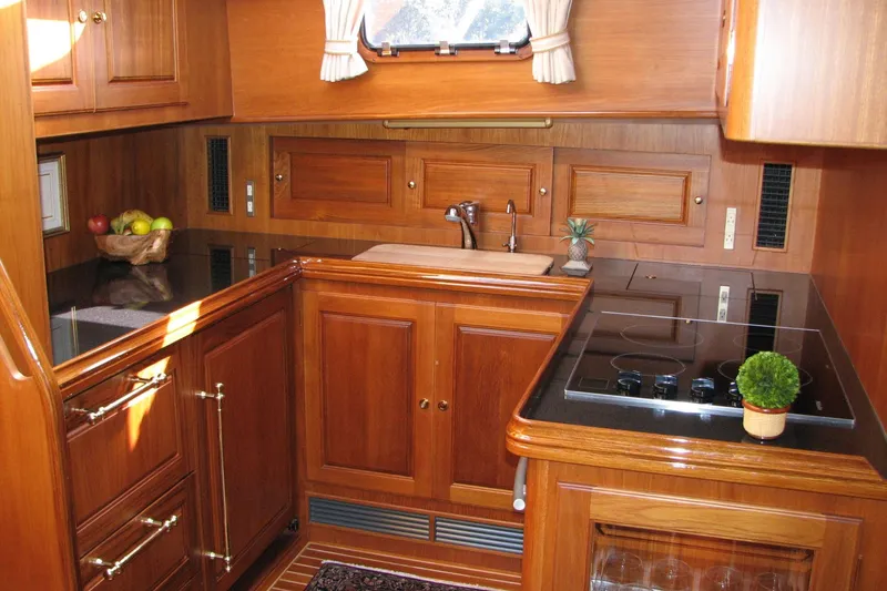 Slide: The Image of Luxurious wooden kitchen interior of 2008 Alden 52 Salon Express yacht. - 20