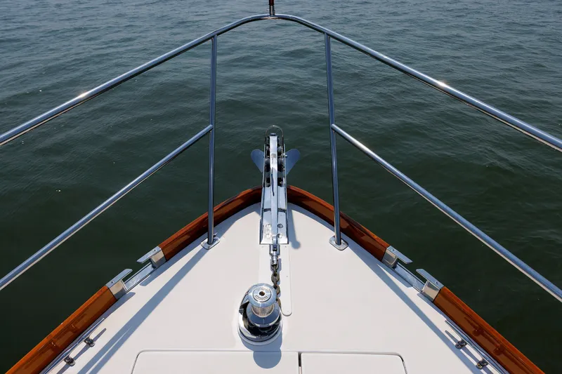 Slide: The Image of Bow view of 2008 Alden 52 Salon Express yacht on calm water. - 42