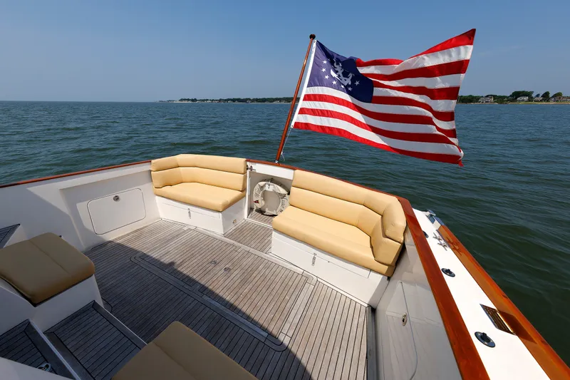 Slide: The Image of Alden 52 Salon Express 2008 yacht deck with seating and American flag. - 41