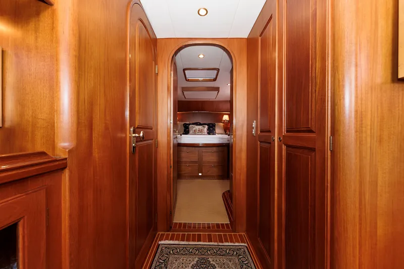 Slide: The Image of Luxurious wooden interior of 2008 Alden 52 Salon Express yacht cabin hallway. - 27