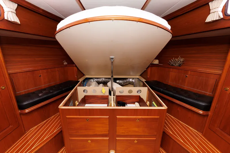 Slide: The Image of Luxurious 2008 Alden 52 Salon Express yacht interior with open storage compartment. - 32