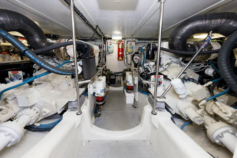 Slide: The Image of Engine room of 2008 Alden 52 Salon Express yacht, showcasing mechanical components and systems. - 47