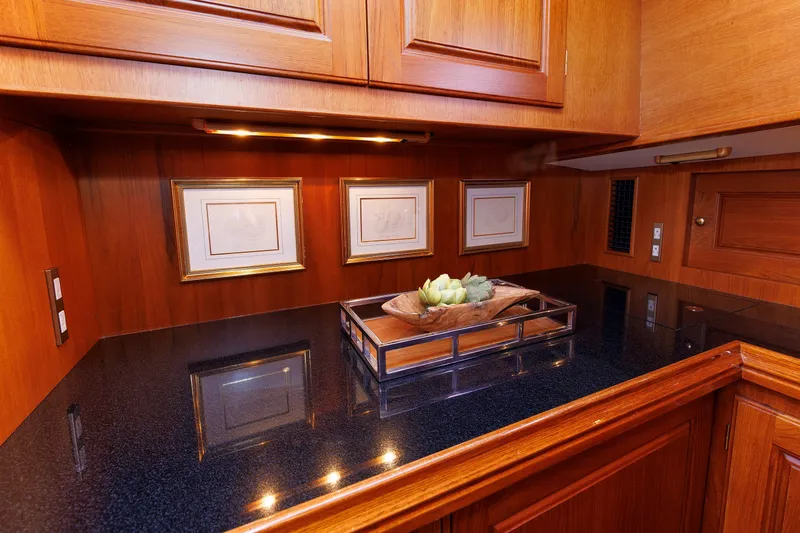 Slide: The Image of Luxurious wooden interior of 2008 Alden 52 Salon Express yacht with elegant decor. - 23