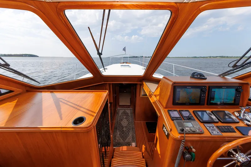 Slide: The Image of Interior view of 2008 Alden 52 Salon Express yacht cockpit with navigation equipment. - 14