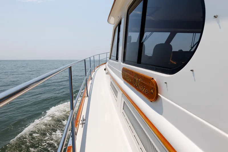 Slide: The Image of Alden 52 Salon Express yacht cruising on open water, side view, 2008 model. - 44