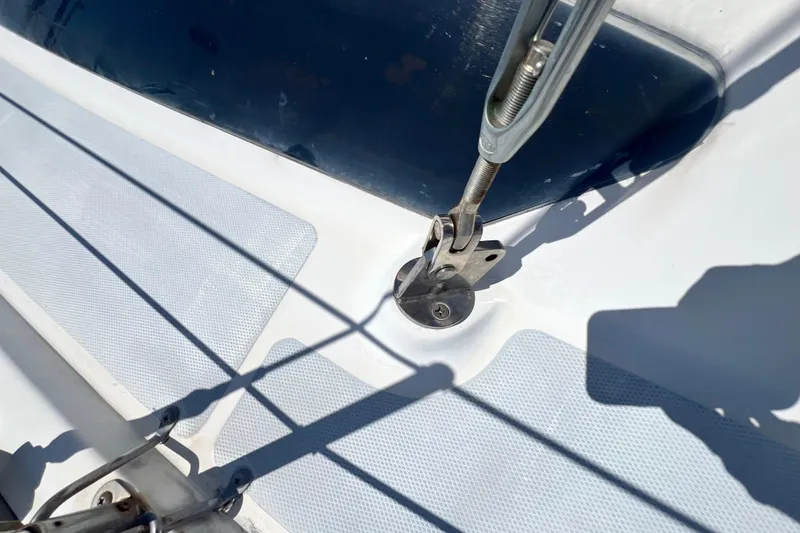 Slide: The Image of Close-up of a 1999 Hunter 380 sailboat deck with rigging details. - 15