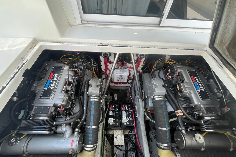 Slide: The Image of Engine compartment of a 1996 Mainship 40 Sedan Bridge with twin 454 PFI engines. - 10
