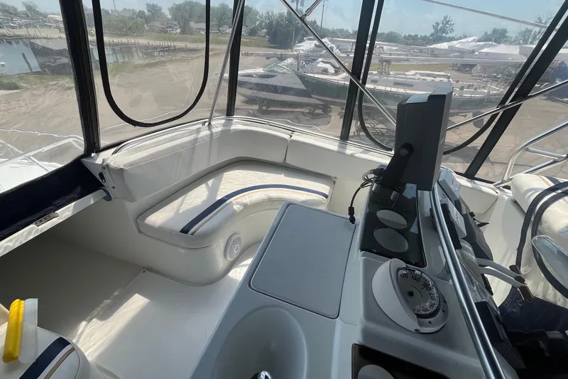 Slide: The Image of Interior view of 1996 Mainship 40 Sedan Bridge cockpit with navigation equipment. - 20