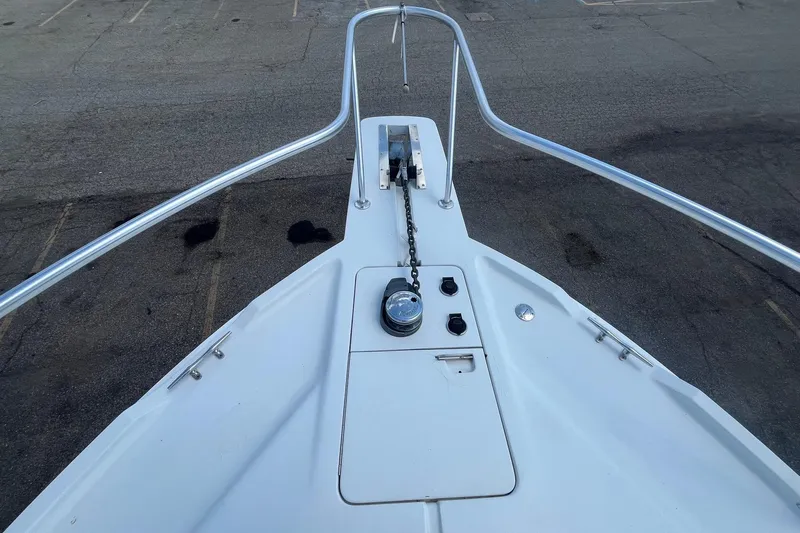 Slide: The Image of Bow view of 1996 Mainship 40 Sedan Bridge with anchor chain and deck details. - 6