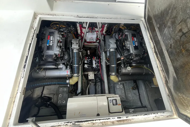 Slide: The Image of Engine compartment of a 1996 Mainship 40 Sedan Bridge with twin 454 EFI engines. - 9