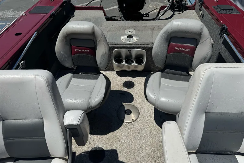 Slide: The Image of Interior of 2012 Tracker Targa V-18 Combo boat with four gray seats. - 20