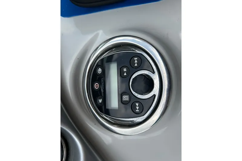 Slide: The Image of Control panel of a 2006 Crownline 270 CR boat with Fusion audio system. - 25