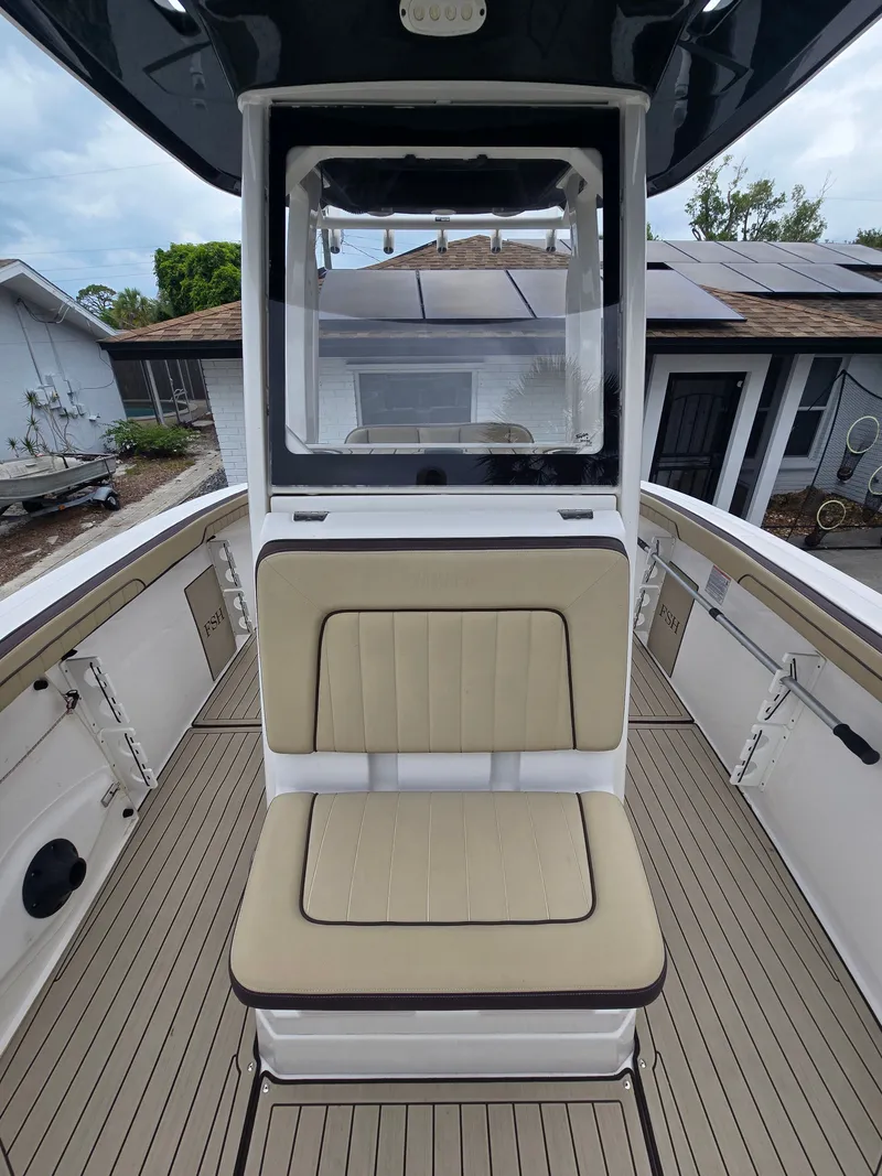 Slide: The Image of Yamaha 255 FSH Sport E 2022 with open storage compartment. - 16