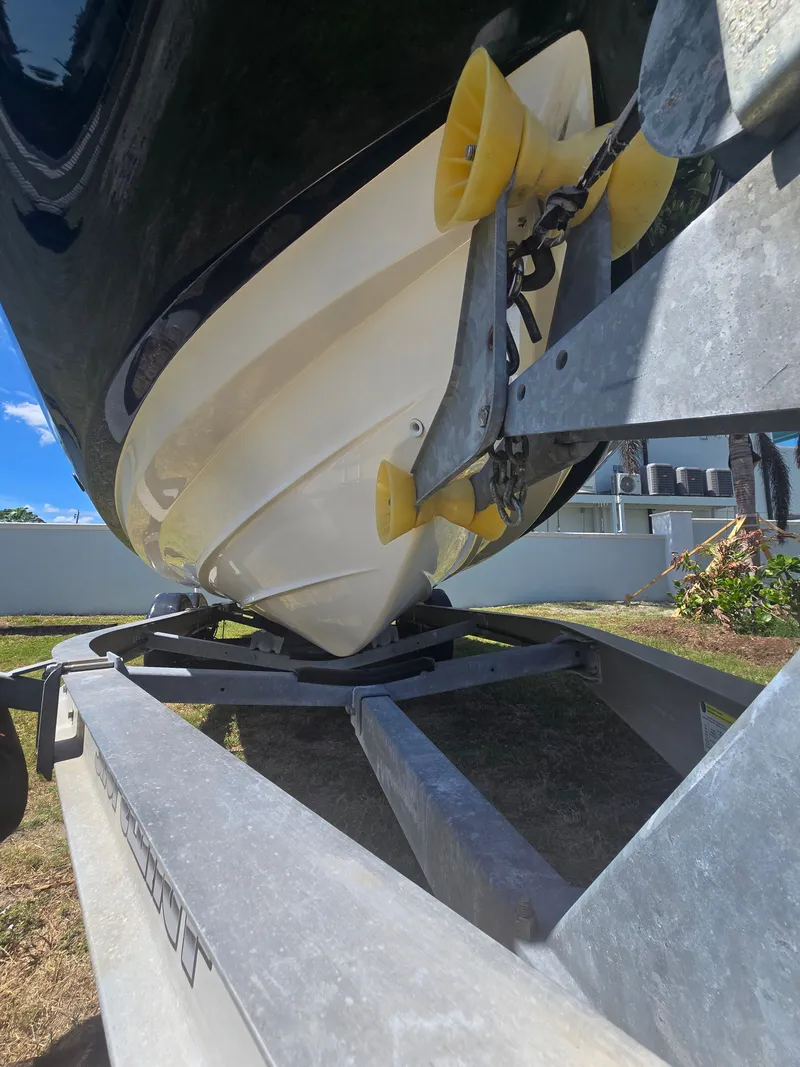 Slide: The Image of Dipstick in engine compartment of a 2022 Yamaha 255 FSH Sport E boat. - 24