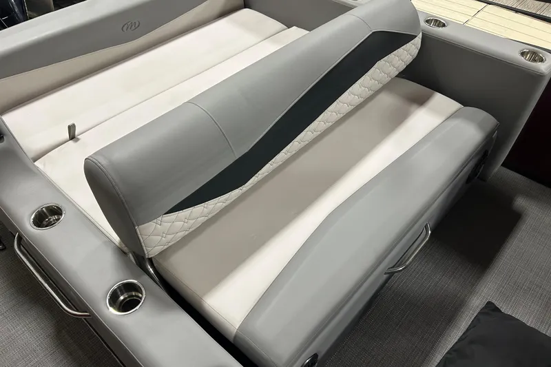 Slide: The Image of Luxurious seating on 2022 Manitou 25 Encore boat with cup holders and stylish upholstery. - 20