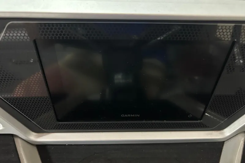 Slide: The Image of Garmin display on 2022 Manitou 25 Encore boat dashboard. - 26