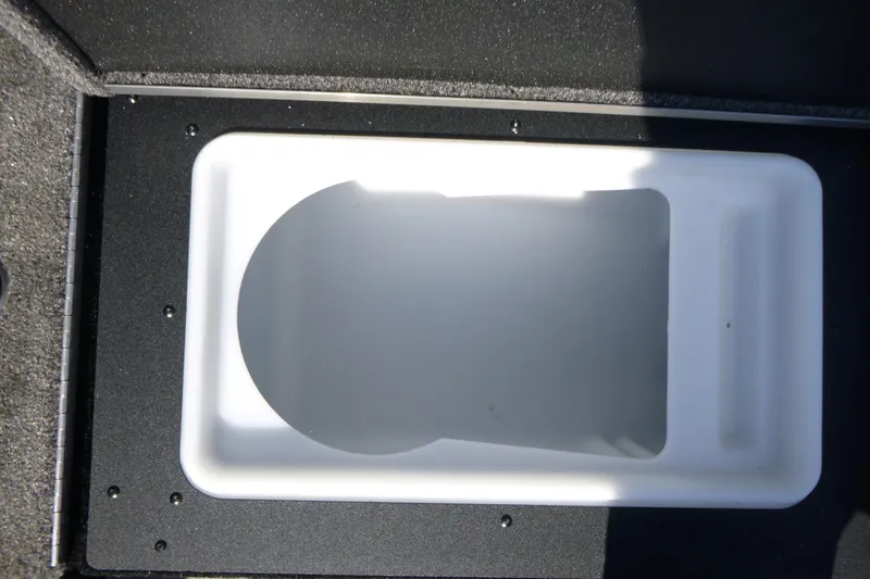 Slide: The Image of 2025 Alumacraft Trophy 185X Sport livewell interior, featuring a sleek white design. - 17
