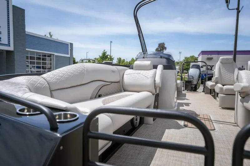 Slide: The Image of Luxurious 2026 JC Sporttoon 26TT pontoon boat with plush seating and modern design. - 23