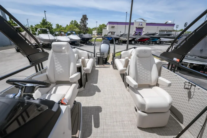 Slide: The Image of Luxurious interior of 2026 JC Sporttoon 26TT pontoon boat with plush seating. - 26