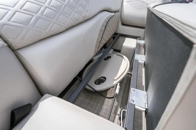 Slide: The Image of Under-seat storage in 2026 JC Sporttoon 26TT boat, featuring cup holders and sleek design. - 30