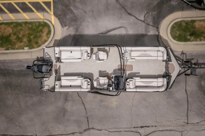 Slide: The Image of Aerial view of 2026 JC Sporttoon 26TT pontoon boat on pavement. - 35