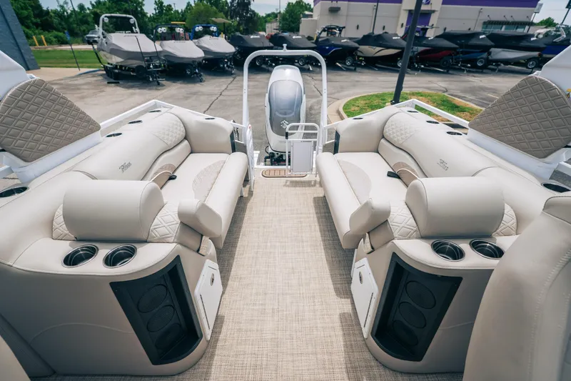 Slide: The Image of Luxurious interior of 2026 JC Sporttoon 26TT pontoon boat with plush seating and cup holders. - 11
