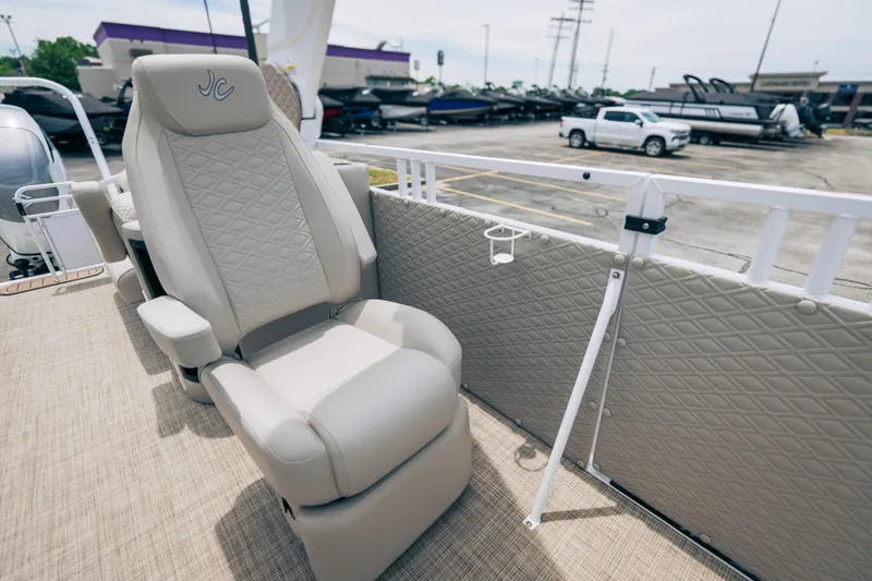 Slide: The Image of Luxurious seating on 2026 JC Sporttoon 26TT pontoon boat, featuring diamond-pattern upholstery. - 13