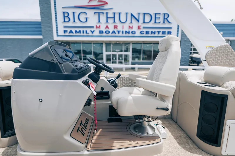 Slide: The Image of 2026 JC Sporttoon 26TT boat interior at Big Thunder Marine showroom. - 14
