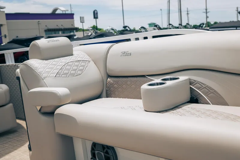 Slide: The Image of Luxurious seating on 2026 JC Sporttoon 26TT boat with cup holders and quilted design. - 18