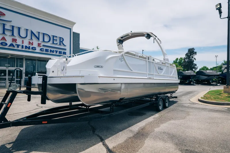Slide: The Image of 2026 JC Sporttoon 26TT pontoon boat on trailer at Thunder Marine Boating Center. - 2