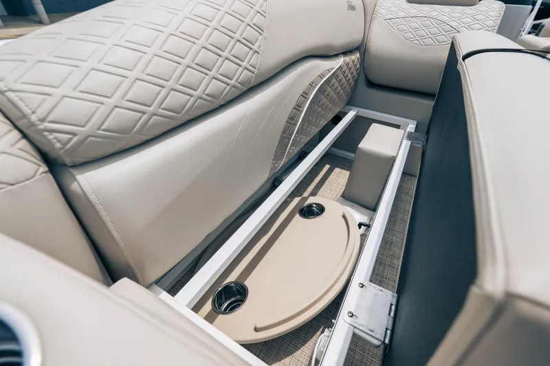 Slide: The Image of Luxurious seating and storage in 2026 JC Sporttoon 26TT pontoon boat interior. - 29