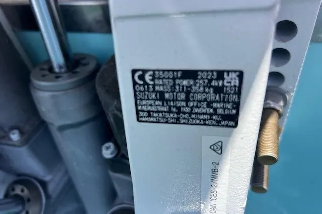 Slide: The Image of Close-up of a Suzuki motor label on a 2024 Bluewhale 3600 WA boat. - 11
