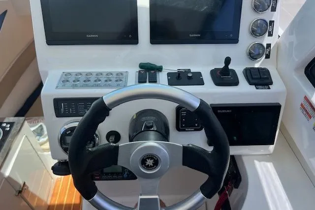 Slide: The Image of Steering console of 2024 Bluewhale 3600 WA boat with modern navigation equipment. - 17